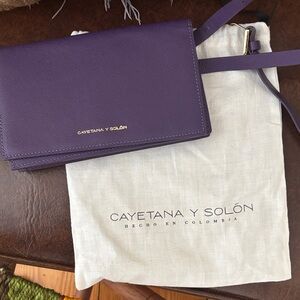 Purple belt bag by Colombian designer